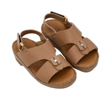 Pair of FARES brand tan pebbled leather sandals with gold-tone buckles and a metallic center stud accent, featuring visible hand-stitching on a white background.