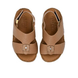 Pair of FARES brand tan pebbled leather sandals with gold-tone buckles and a metallic center stud accent, featuring visible hand-stitching on a white background.