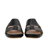 Front view of a pair of FARES black leather sandals with silver buckle details.