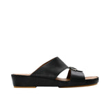 Side view of a FARES beige leather sandal showing the platform midsole and hand-sewn stitching.