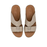 Overhead view of FARES sandals showing the brand logo on the brown leather insole.