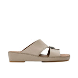 Side view of a FARES leather sandal showing the platform midsole and hand-sewn stitching.