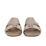 Front view of a pair of FARES taupe leather sandals with silver buckle details.