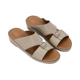 Angled top-down view of the FARES sandals highlighting the dual-strap design and leather footbed.