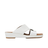 Side view of a FARES beige leather sandal showing the platform midsole and hand-sewn stitching.
