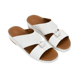 Angled top-down view of the FARES sandals highlighting the dual-strap design and leather footbed.