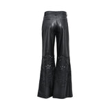 Ermanno Firenze black faux leather flared trousers with intricate laser-cut floral detailing for a bold feminine look. Shop the Latest Online.