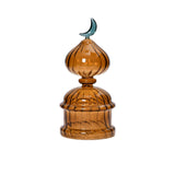 Favorite Glass amber decorative dome ornament with green moon accent. Order Online Today