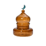 Favorite Glass decorative dome ornament with amber glass body and green moon accent. Find the Collection Online