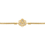Close-up horizontal detail shot of the bracelet's center, highlighting the precise connection of the gold-plated end caps to the dimensional six-petal flower charm.