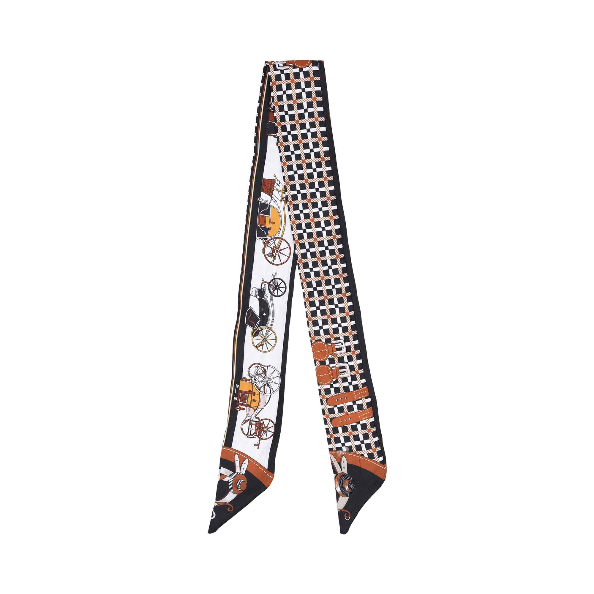 Flat view of the Muni double row carriage print scarf in black with multicolor detailing. Shop Now Online