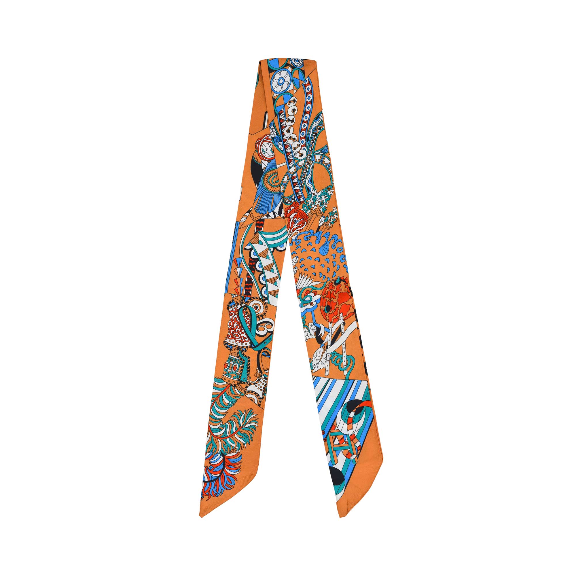 Flat view of the Muni women’s Orange multicolor geometric printed twilly scarf, featuring blue and orange abstract geometric design. Shop Online Today