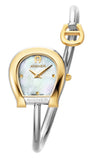A direct studio front catalog portrait of the women's Aigner Flora L watch, highlighting its two-tone gold and silver horseshoe case, textured checkered white Mother of Pearl dial, and the wrapping tubular steel bangle with its contrast yellow gold horseshoe logo charm.