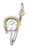 A front studio portrait of the Aigner Flora ladies' watch, displaying its crystal-studded gold bezel, horseshoe case, white mother-of-pearl dial, and open bypass silver bangle with a gold charm terminal.