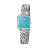 A direct vertical studio shot of the Escada Ava 22mm square stainless steel ladies' watch, highlighting its vibrant blue turquoise dial and matching silver woven mesh bracelet.