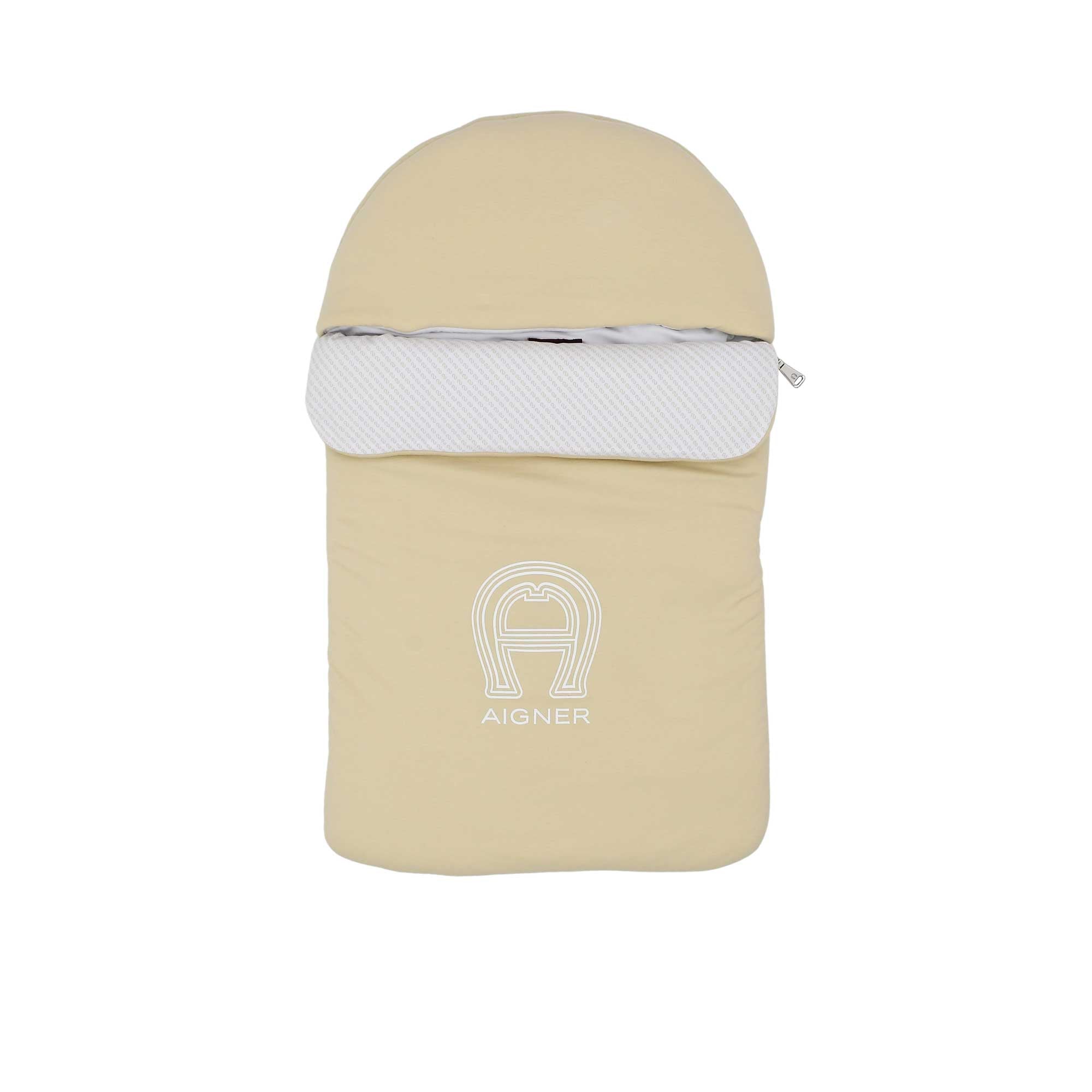 Front closed view of the Aigner kids newborn logo padded beige baby nest  cocoon and fold-over cover. Shop Now Online