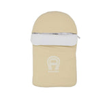 Front closed view of the Aigner kids newborn logo padded beige baby nest  cocoon and fold-over cover. Shop Now Online