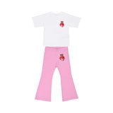 Front full-set view of the Moschino kids girls white T-shirt and pink trousers teddy print set. Shop Now Online