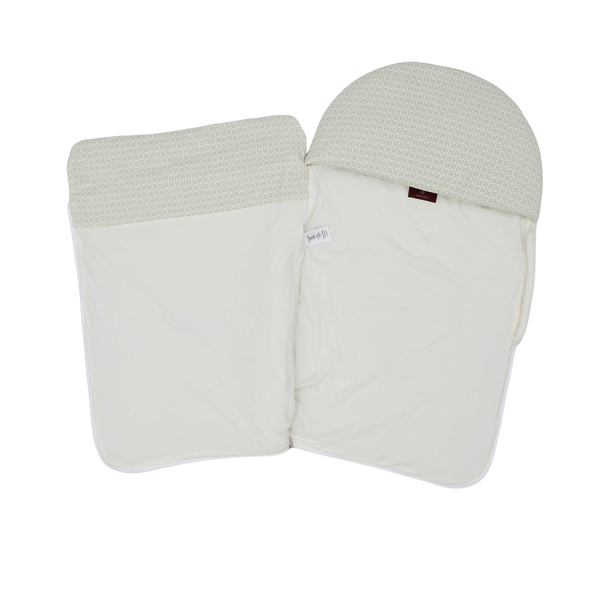 Front opened view of the Aigner kids newborn White baby nest with gold logo frame and monogram hood Available for Online Purchase