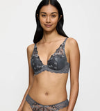 Front view of model wearing the Triumph Sensual Spotlight grey wired padded bra, highlighting the delicate lace cups and supportive structure. Shop Online at Blue Salon Qatar