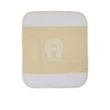 Front view of the Aigner kids newborn beige blanket with large logo and textured borders Shop the Latest Online