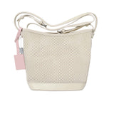 Front view of the Karisma mesh leather crossbody bucket bag in White, featuring a geometric mesh pattern, adjustable crossbody strap, and signature logo tag. Shop Now Online