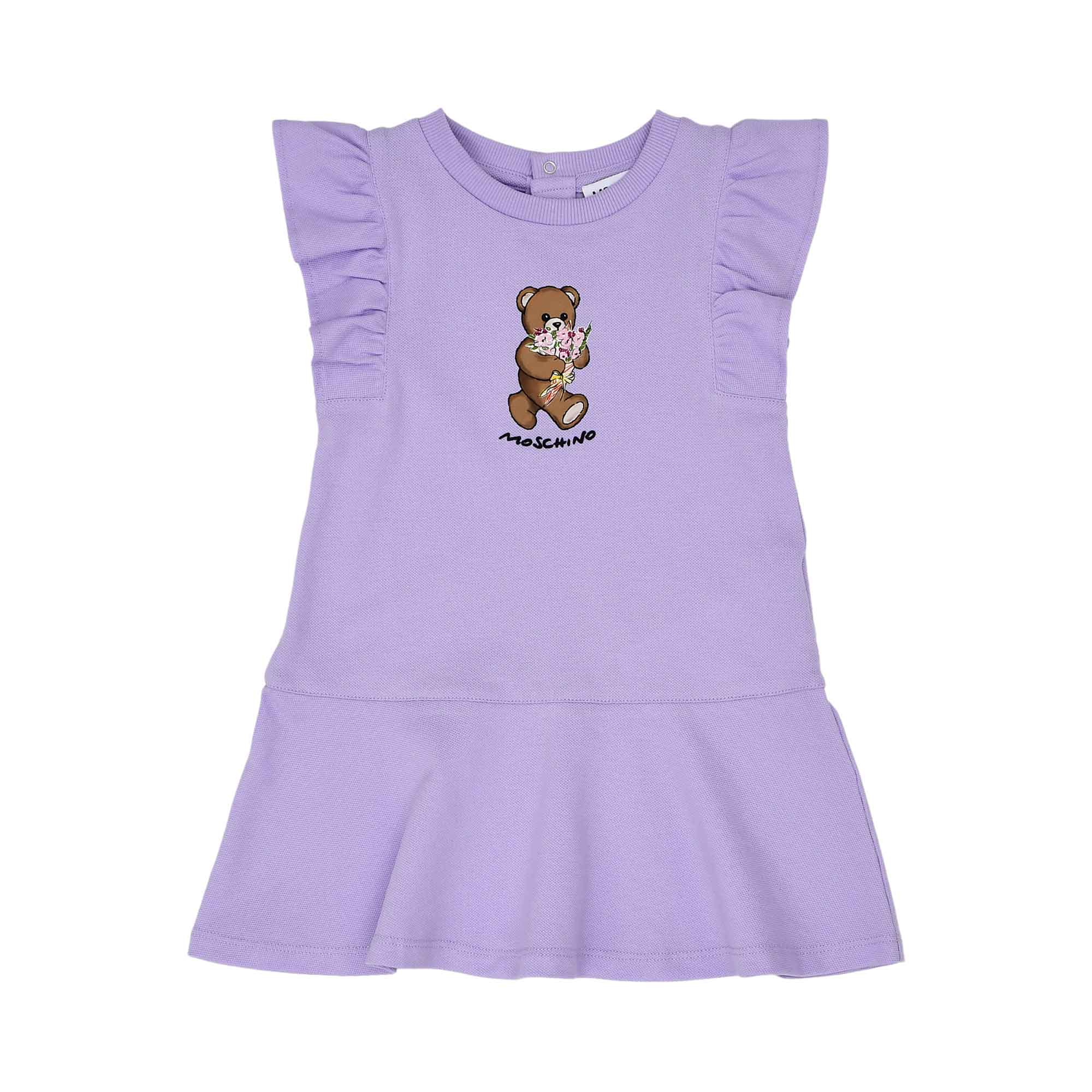 Front view of the Moschino kids baby girl purple dress teddy print ruffle sleeves. Shop the Latest Online