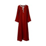 Front view of the Nero women's red velvet floral embellished jalabiya. neckline. Shop Now Online
