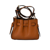 The back of the Pourchet  pebbled leather bag, highlighting the structured "blossom" silhouette and smooth leather trim detailing.