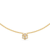 Symmetrical frontal view of the Saint Honoré Burj gold-plated necklace on a white background, highlighting the small layered flower pendant inset with iridescent Mother of Pearl.
