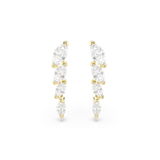 A clear direct frontal product view of the matching Swarovski Mesmera earrings, showcasing the vertical gradient arrangement of four sparkling white marquise-cut crystals.