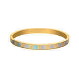 A direct frontal studio product photograph of the Escada Eliza hinged bangle, showcasing the gold-plated frame, the iridescent Mother of Pearl inlay, and the repeating yellow gold monogram logo.