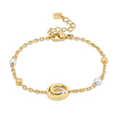 Full front view layout of the gold-plated Cerruti 1881 Celeste chain bracelet, displaying its crystal-accented round central motif.