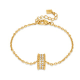 Full front view layout of the gold-plated Cerruti 1881 Isadora chain bracelet, displaying its crystal-bordered round logo medallion.
