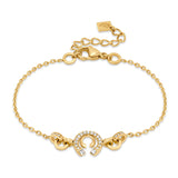 Full view of the gold-plated Cerruti 1881 Amalia bracelet, showcasing its interlocking double C crystal motif and adjustable chain.