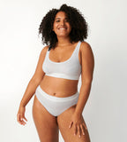 Full Front view of model wearing the Sloggi Double Comfort white maxi panty, showing the high-waist design and thick comfort waistband. Shop the Latest Online