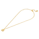 A full-length studio product presentation of the Escada Madelene necklace, showing the entire gold-plated fine cable chain, the round Mother of Pearl monogram pendant, and the adjustable clasp setup.