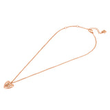 A full-length studio product presentation of the Escada Mina necklace, showcasing the warm rose gold-plated cable chain, the central layered heart logo pendant, and the adjustable clasp assembly.