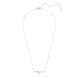A full overhead studio view of the Swarovski Matrix curved pendant necklace, showing the complete drape of the fine rhodium-plated link chain and the delicate asymmetric drop.