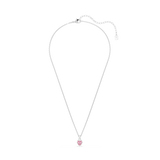 A full overhead studio view of the Swarovski Chroma necklace, displaying the complete length of the fine rhodium-plated cable chain and the perfect hanging drop of the pink heart pendant.