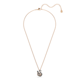 A full-length studio layout of the Swarovski Swan pendant necklace, showcasing the entire length of the delicate 18K rose gold-plated link chain supporting the dark crystal swan pendant.