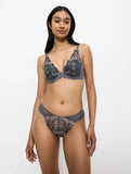 Full front view of model wearing the Triumph Sensual Spotlight grey highleg Brazilian panty, showcasing the sheer mesh and high-cut lace detailing. Shop Online Today