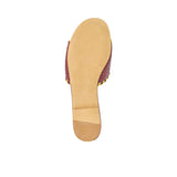 Bottom view of a GAIA flat sandal showing the smooth tan leather sole and heel tap from BLUE SALON.