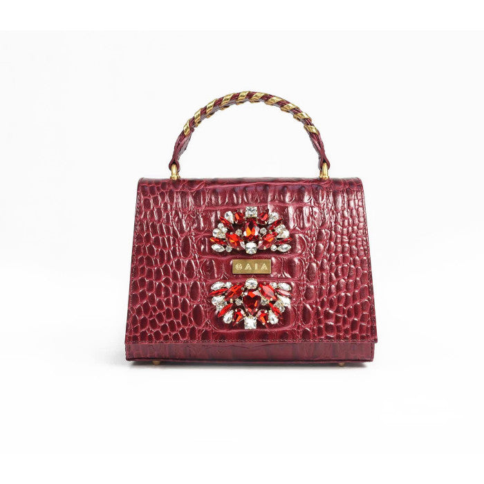 Front view of the GAIA Victorian Mini bag in maroon croc-embossed leather featuring emerald crystal fan embellishments and a gold brand plate.