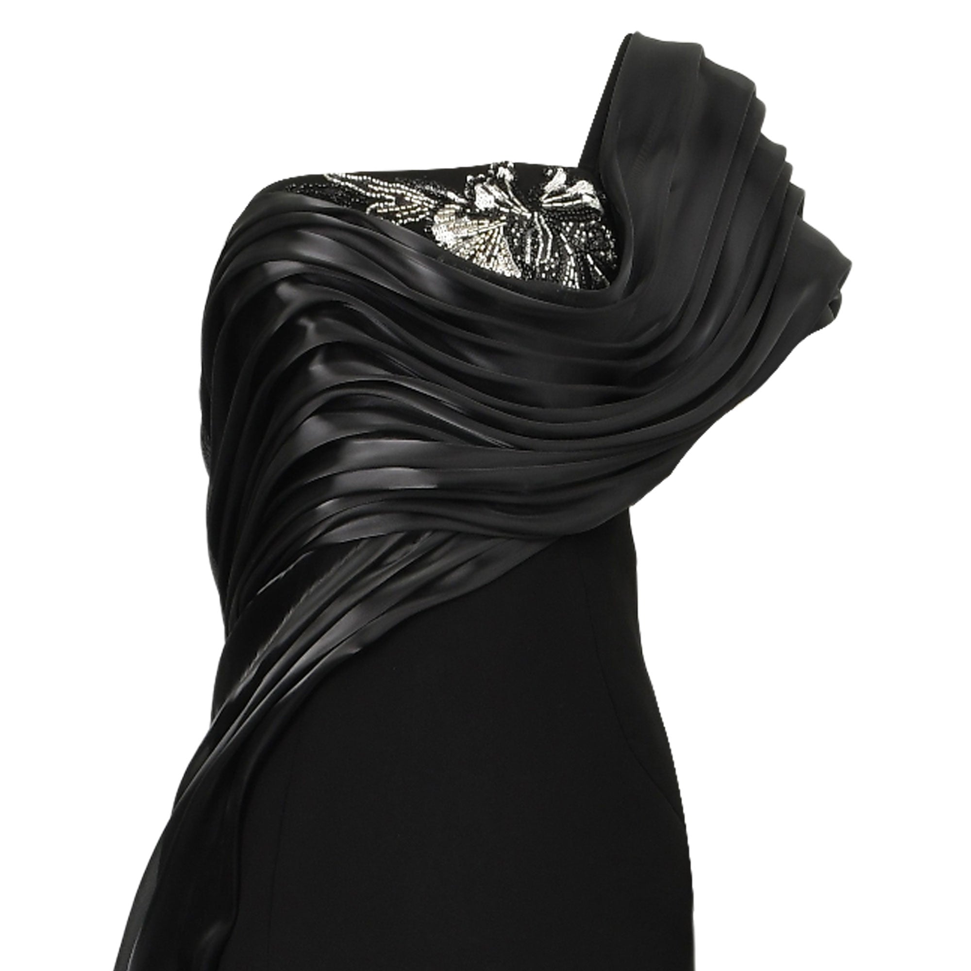 Black one-shoulder dress with a wide, draped, pleated strap. The bodice has horizontal pleats and silver-toned beaded floral