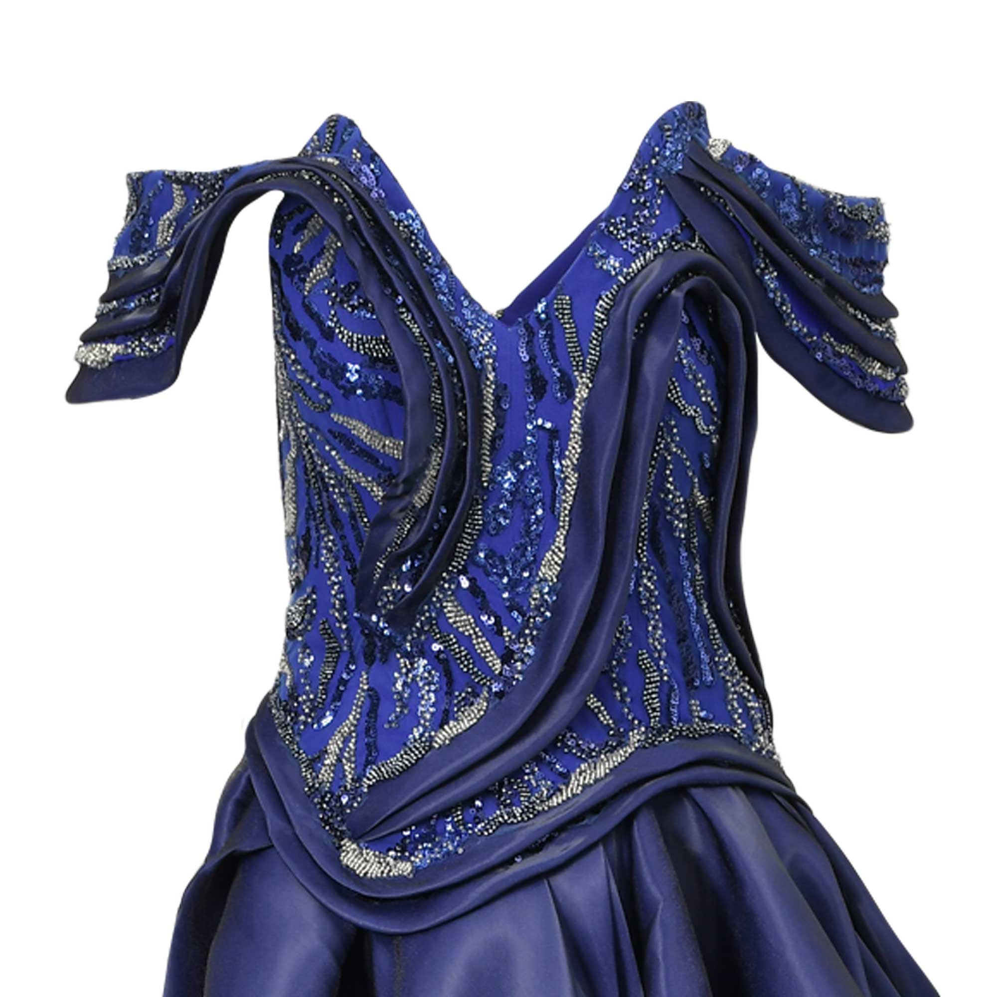 Blue off-shoulder gown with V-neck. Bodice has draped fabric and wavy silver-toned bead and blue sequin patterns. Full skirt.