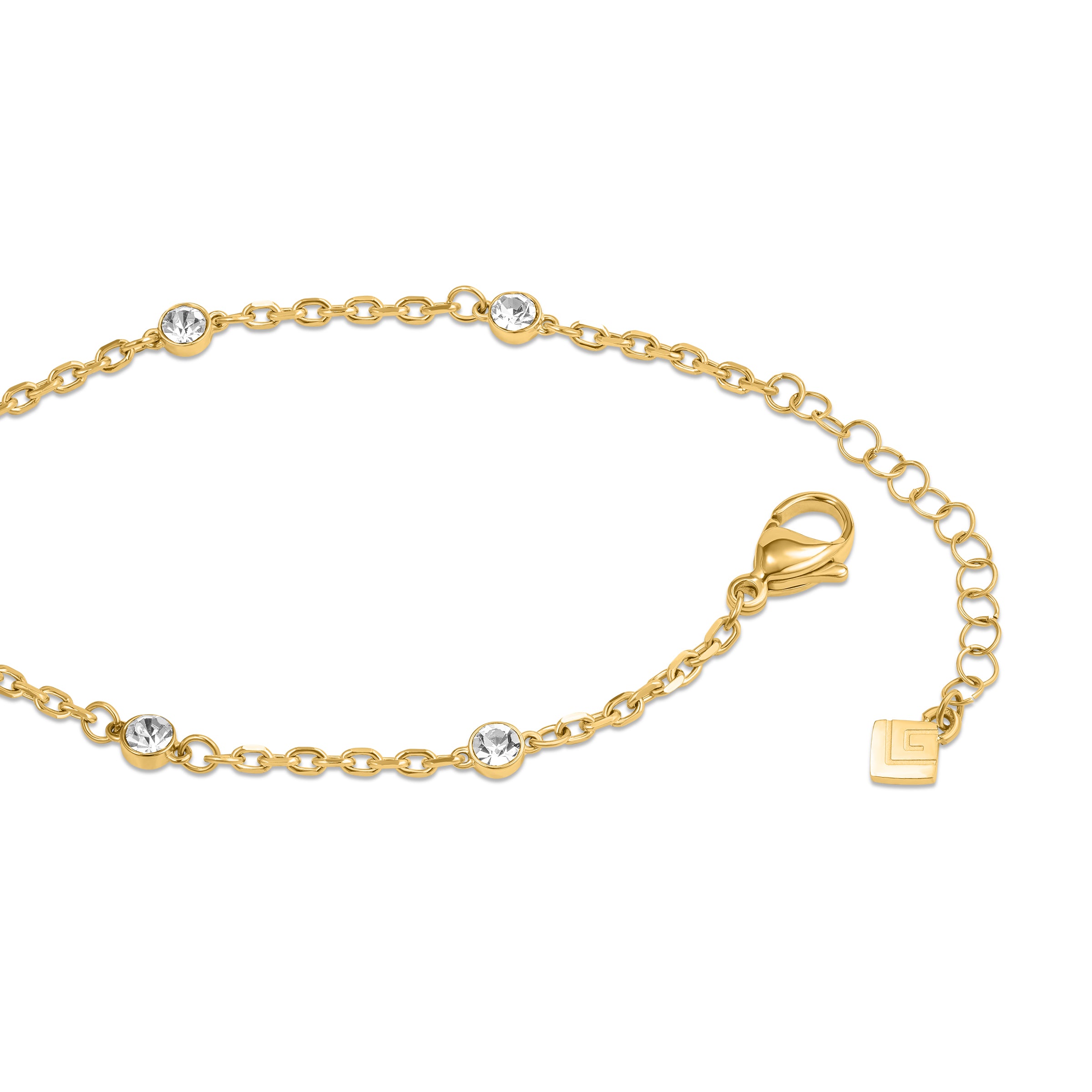 Gold-toned chain bracelet with multiple clear round crystals. Features a lobster clasp and extender chain with a square logo