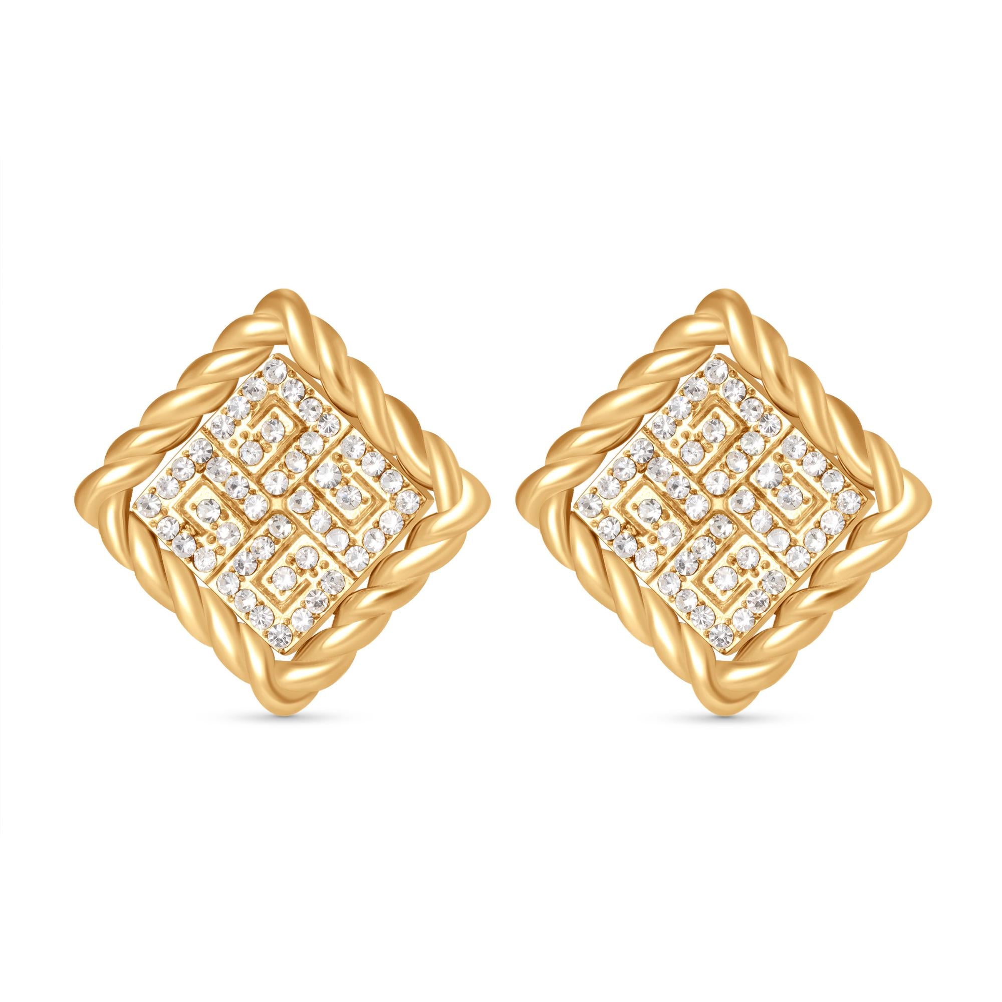Pair of gold-toned diamond-shaped stud earrings with a twisted wire border and a central geometric pattern of clear crystals.