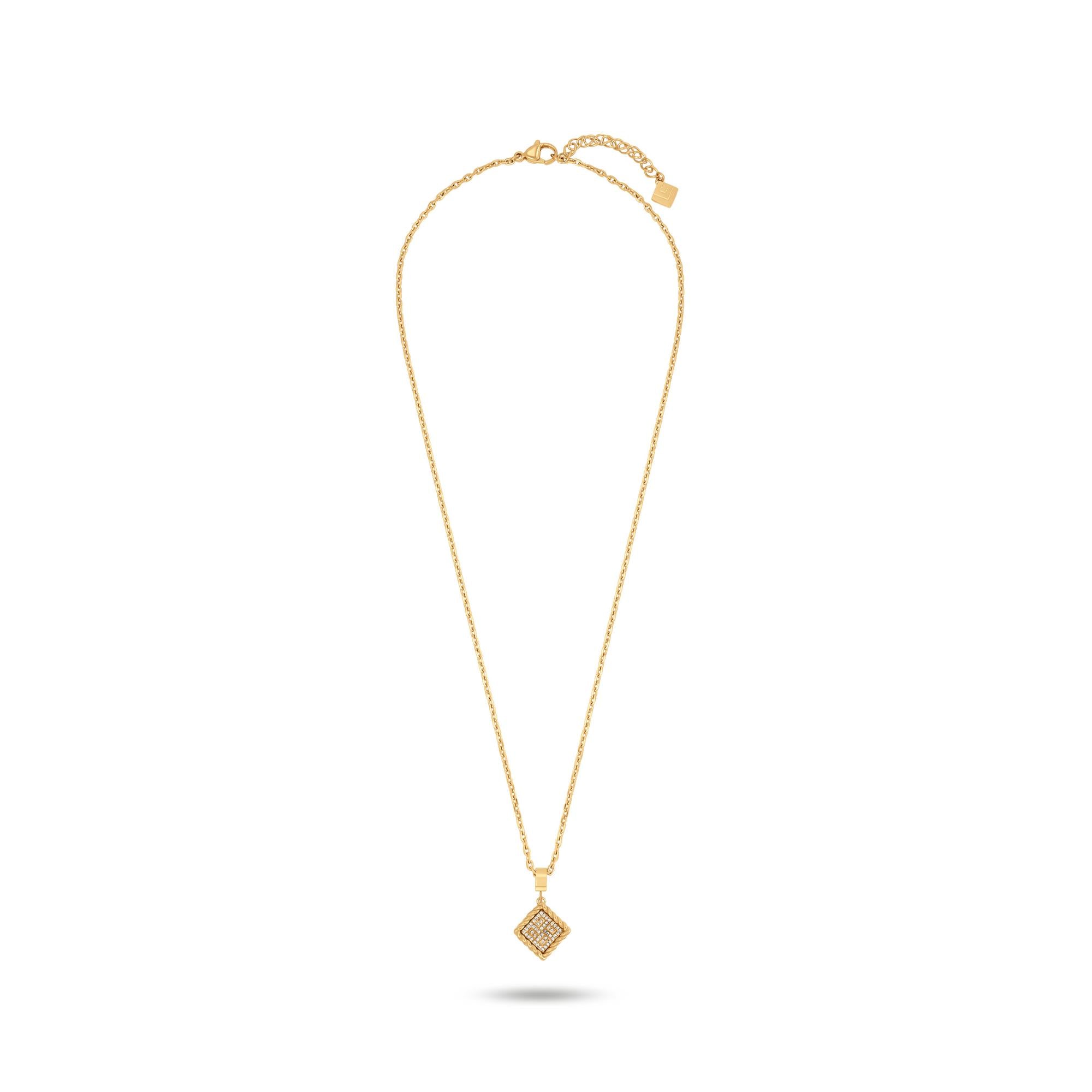 Gold-toned necklace with a thin chain and a square pendant set diagonally. The pendant is encrusted with clear crystals and h