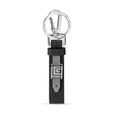 Guy Laroche keyring with a black and grey textured leather strap, silver-toned metal logo, split ring, and swivel clasp.
